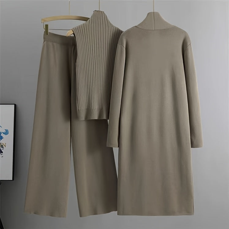 New High-Elasticity Autumn And Winter 2024 Women'S Loose Knit Set Featuring Long Wide-Leg Pants, a Shawl Cardigan, And a Turtleneck Sweater in a Stylish Three-Piece Ensemble.